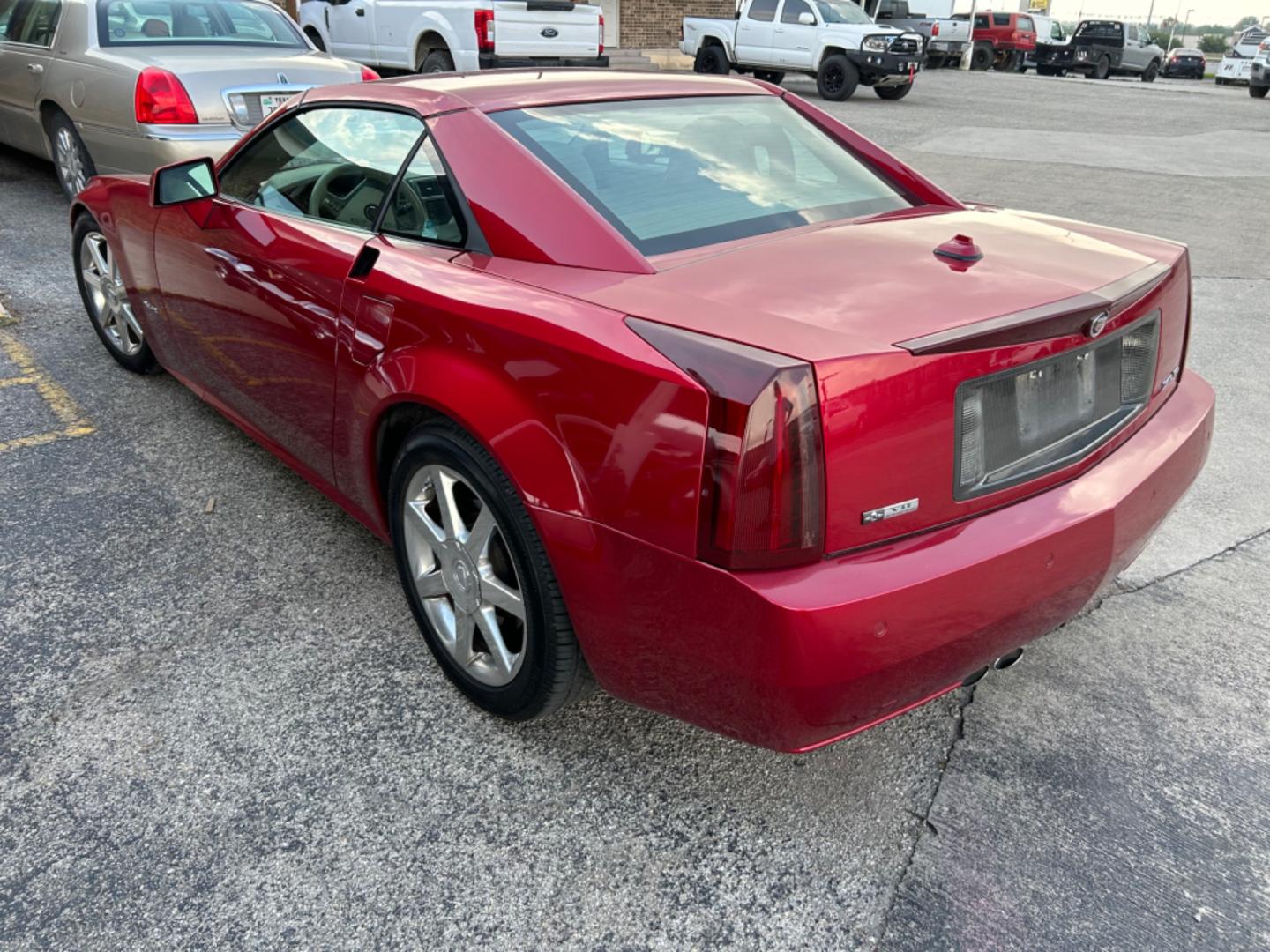 2005 Red Cadillac XLR Convertible (1G6YV34A355) with an 4.6L V8 DOHC 24V engine, 5-Speed Automatic Overdrive transmission, located at 1687 Business 35 S, New Braunfels, TX, 78130, (830) 625-7159, 29.655487, -98.051491 - Photo#2